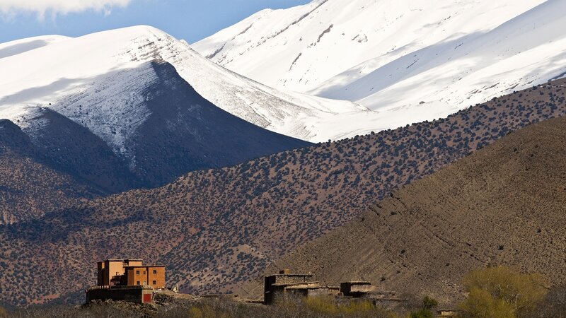 Snow-capped mountains with village