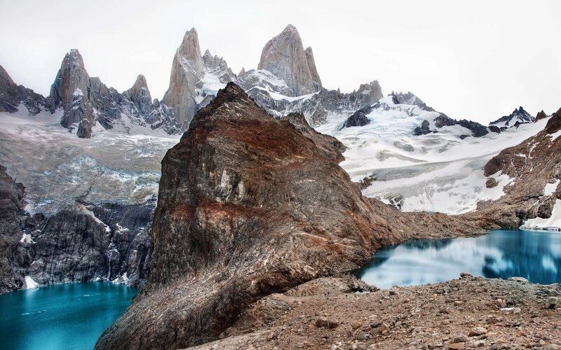 Snow-capped peaks and turquoise lake