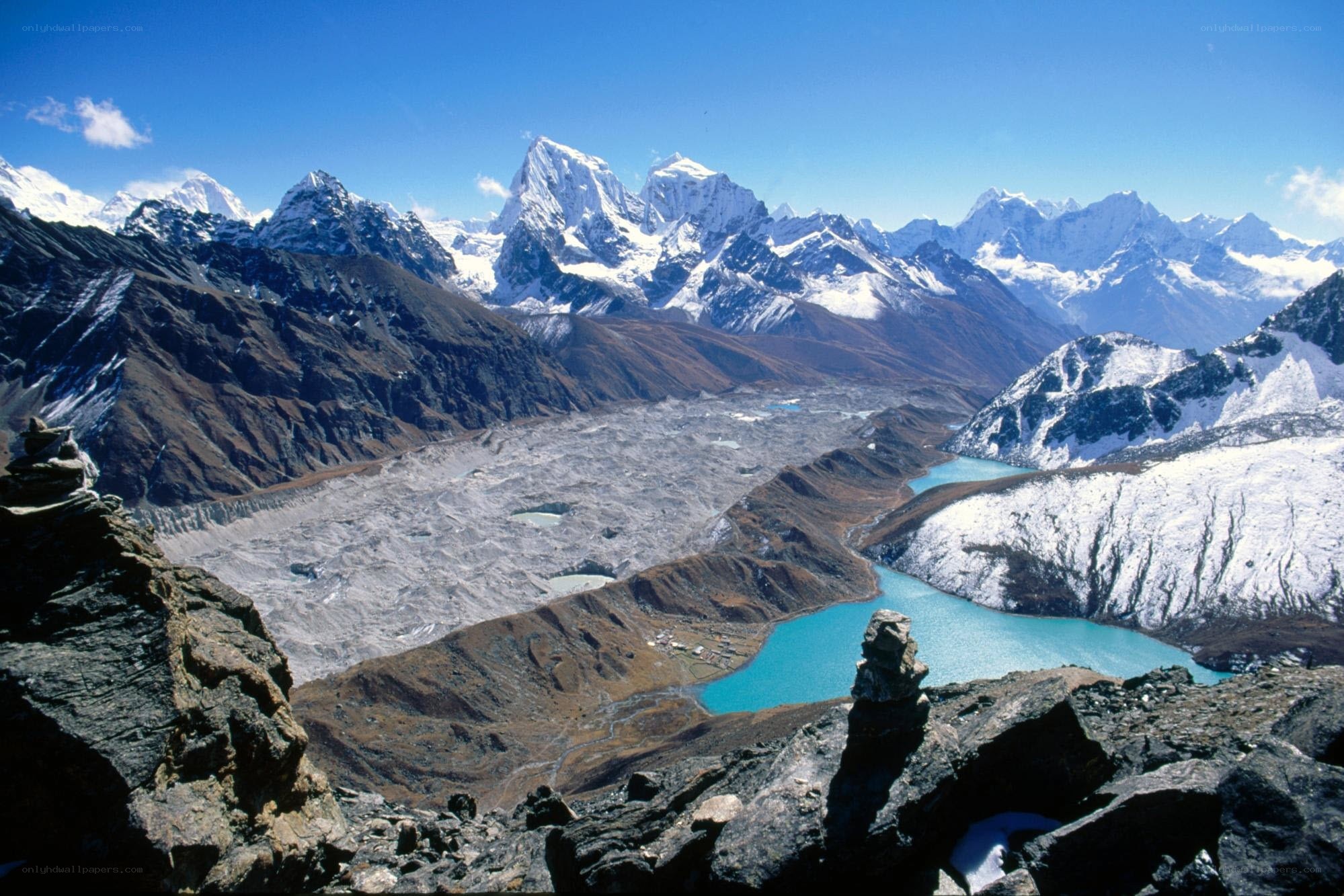 Snow-capped peaks and turquoise lake