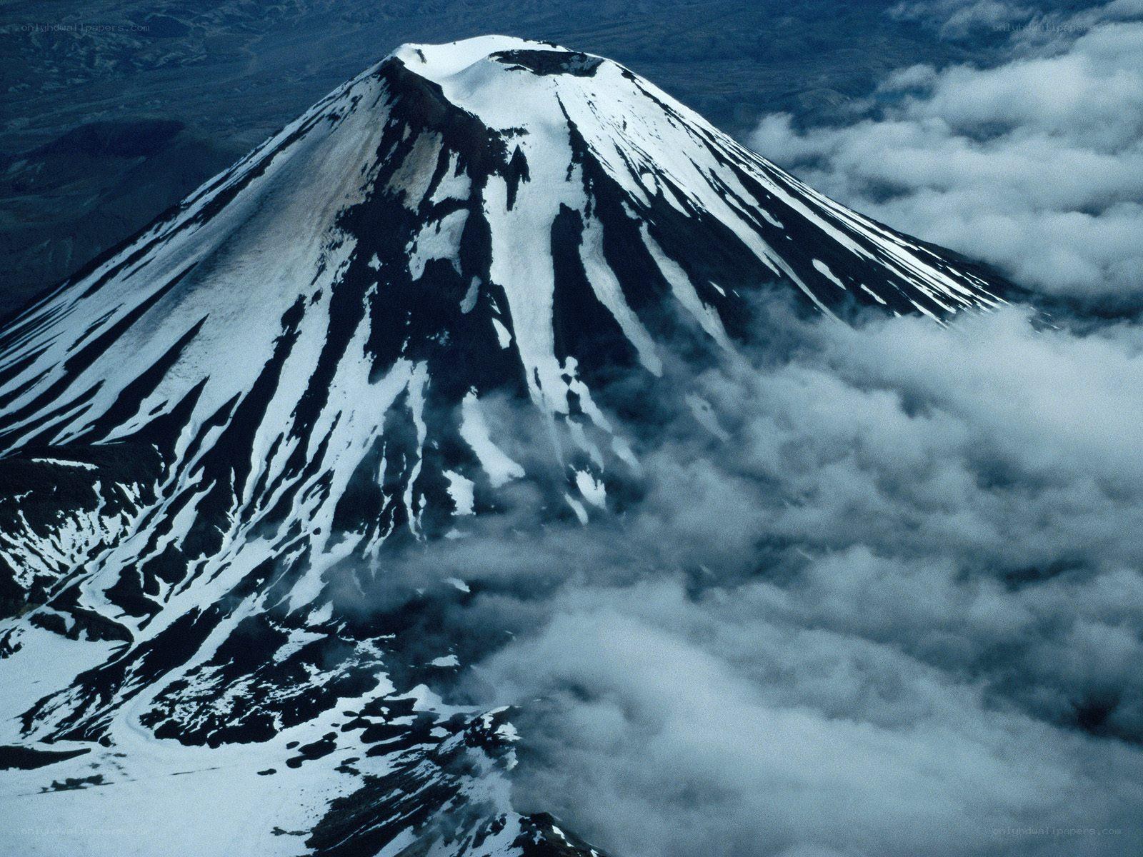 Snow-capped volcanic mountain