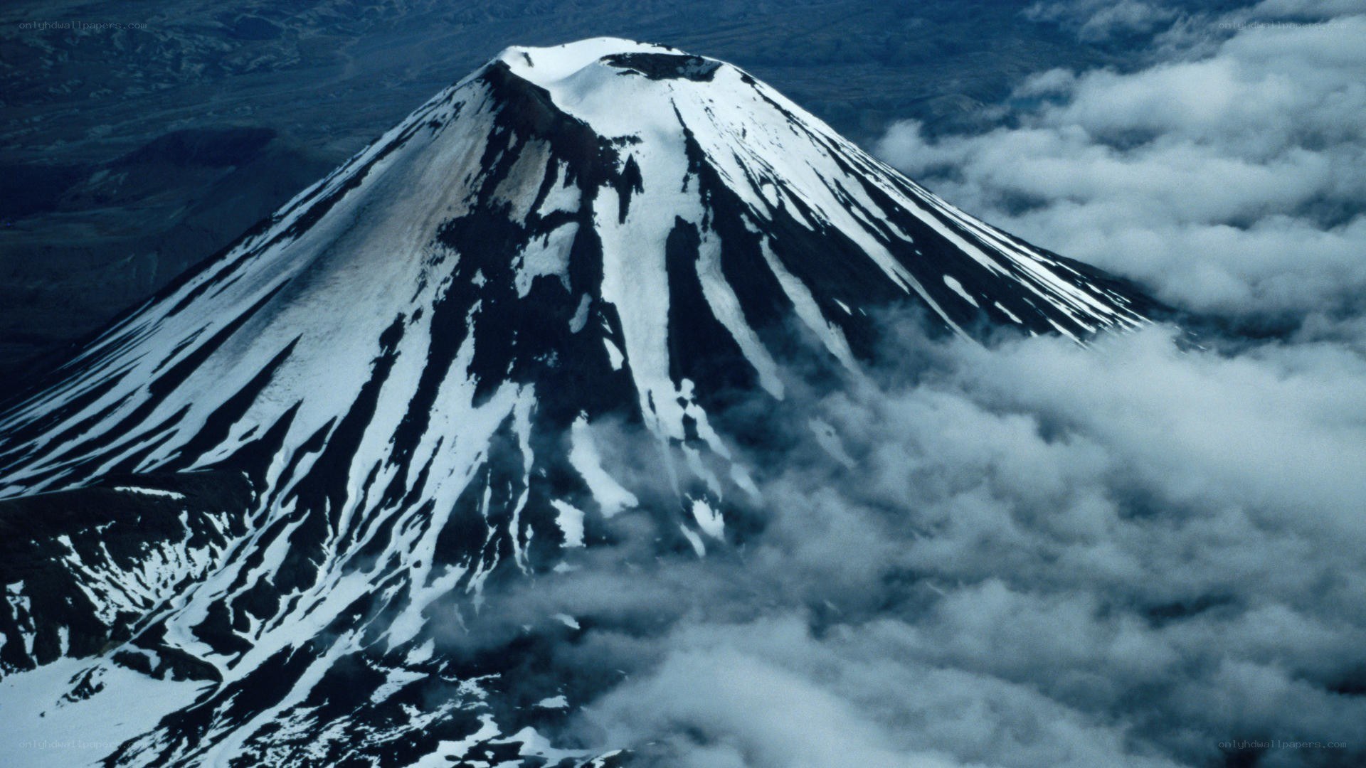 Snow-capped volcanic mountain