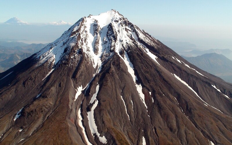 snow-capped volcanic mountain