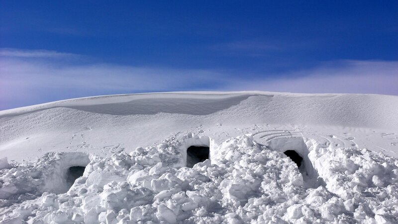 Snow Caves in Snowfield — White, Serene