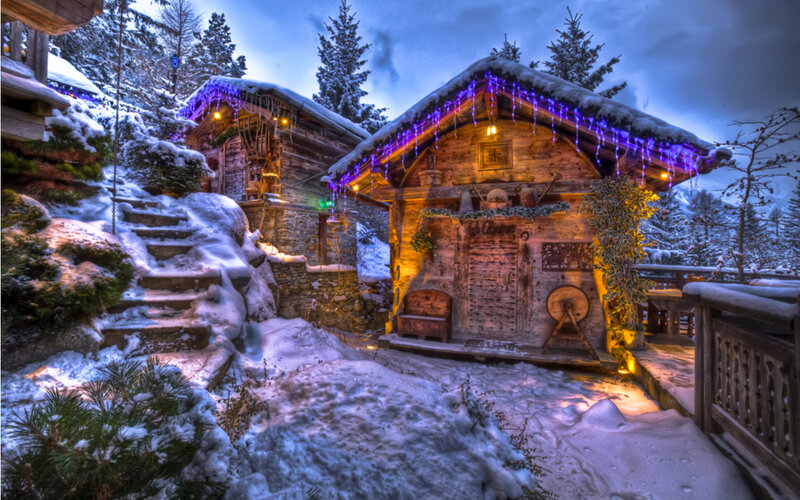 Snow-covered Alpine Cabins