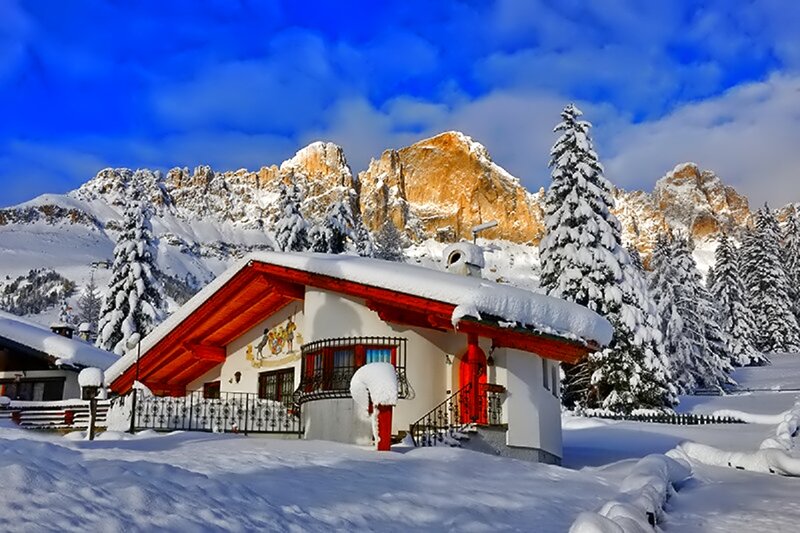 Snow-covered Alpine Cottage