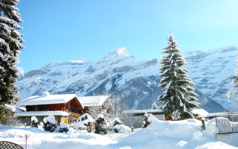 Snow-covered Alpine Village — White, Serene