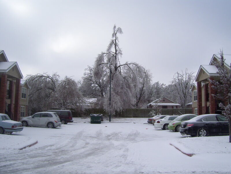Snow-covered apartment complex