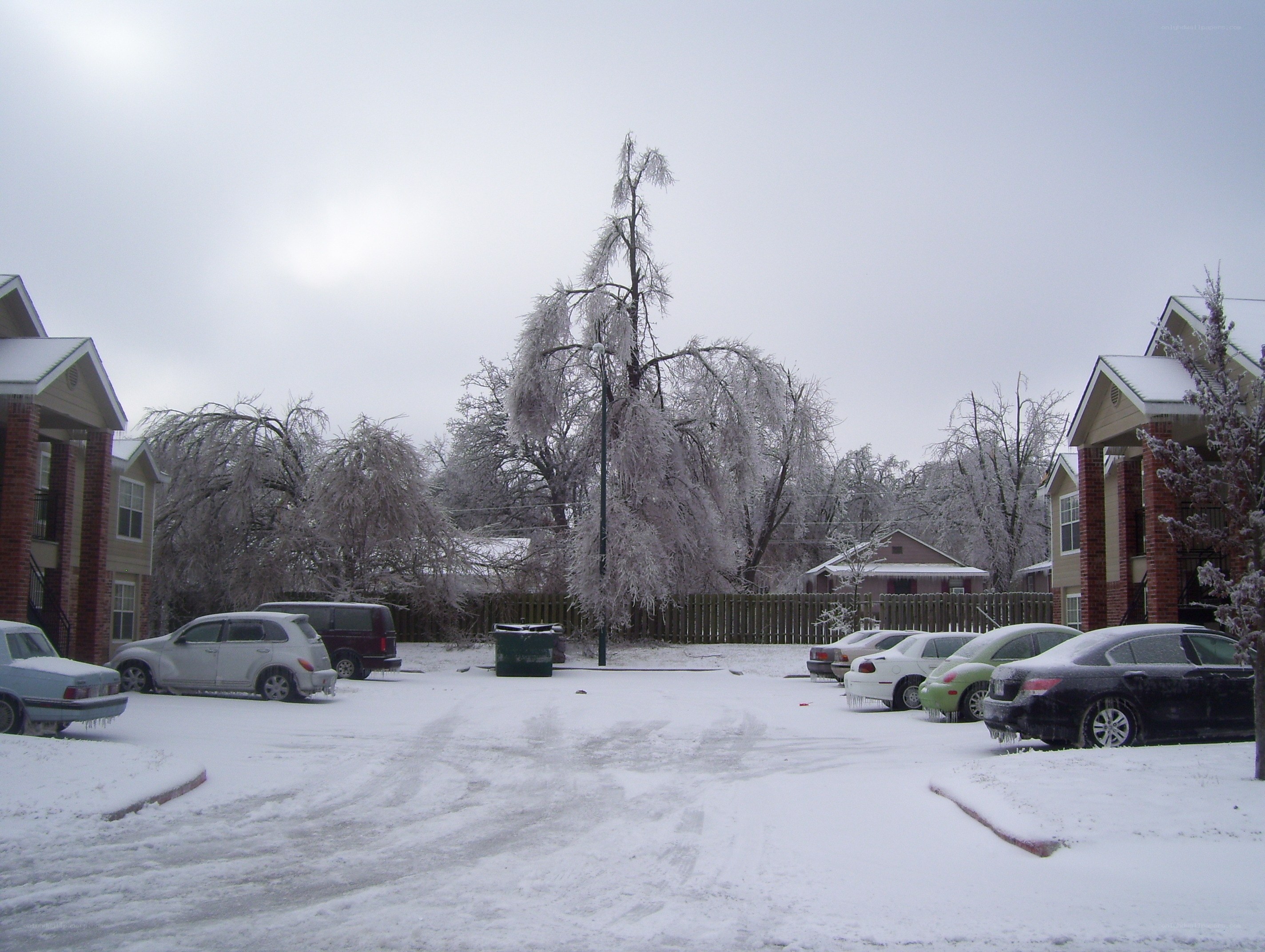 Snow-covered apartment complex