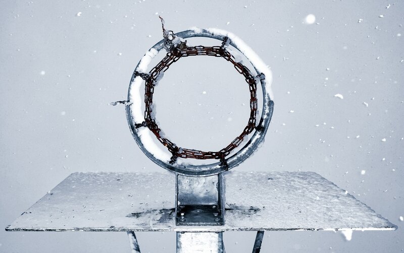 Snow-covered Basketball Hoop