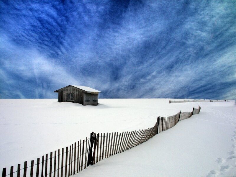 Snow-covered beach hut