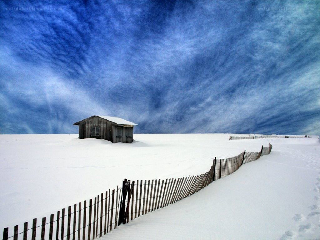 Snow-covered beach hut