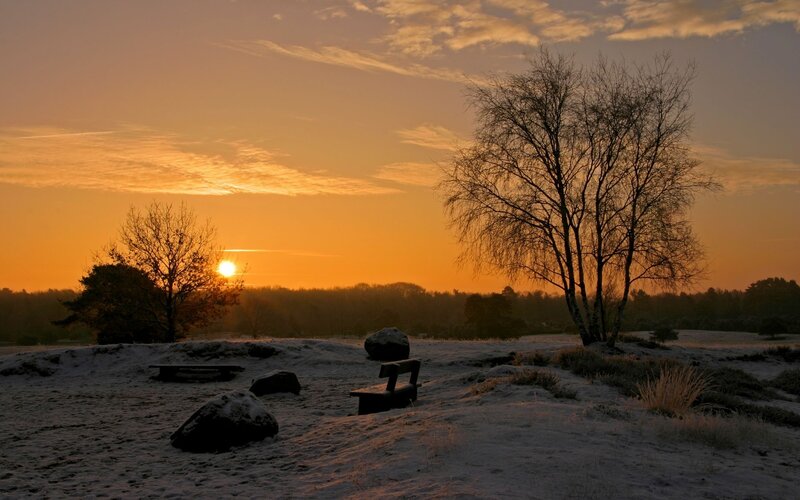 Snow-covered Bench at Sunset — Orange
