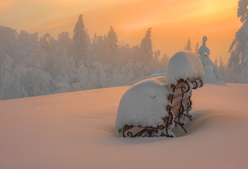 Snow-covered Bench — Orange, Serene, Winter