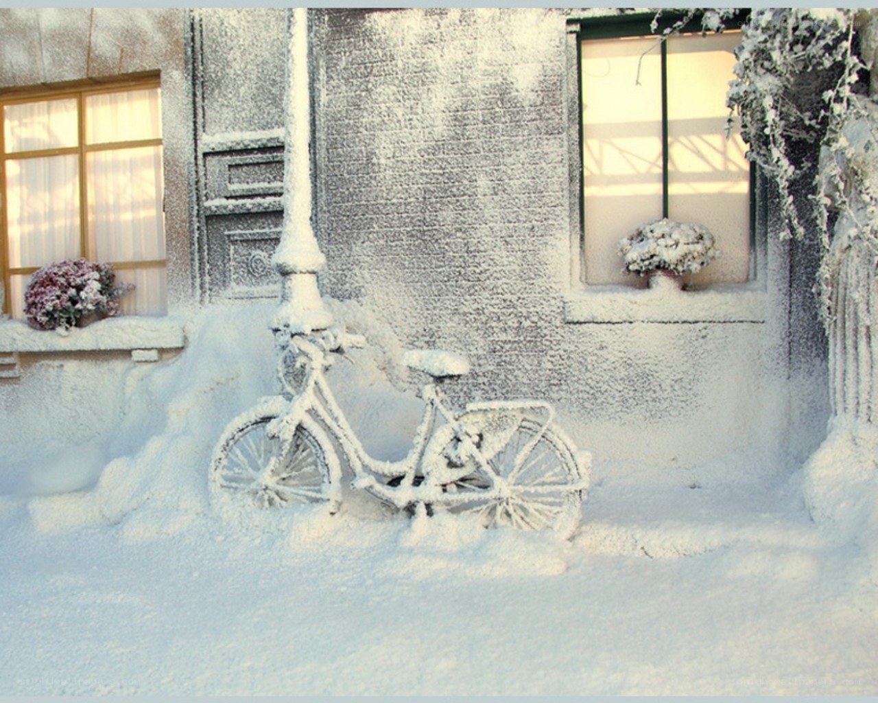 Snow-covered bicycle in winter