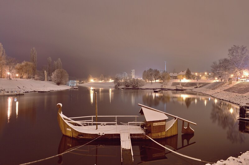 Snow-covered Boat on River — Brown