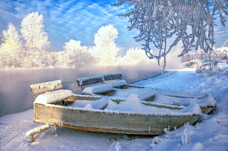 Snow-covered Boat on Riverbank — White, Serene