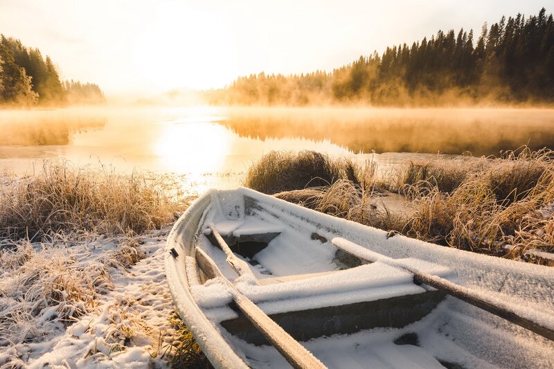 Snow-covered Boat on Shore — White