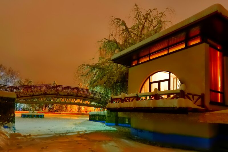 Snow-covered Bridge at Night — Orange