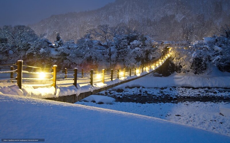 Snow-covered Bridge at Night — White, Serene, Photograph, River, Trees, Mountain, Blue, Yellow
