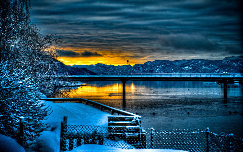 Snow-covered Bridge at Sunset — Blue, Dramatic, Photograph, Mountains