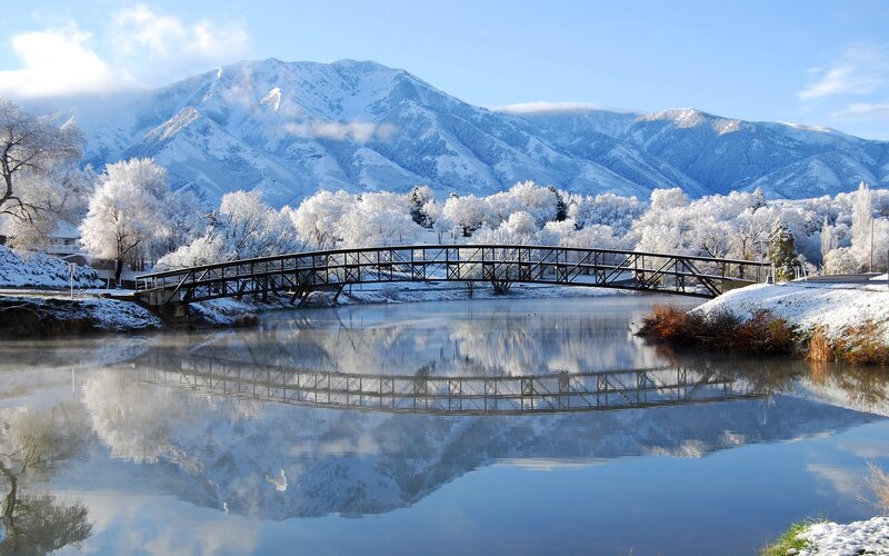 Snow-covered Bridge — Blue, Serene, Winter, Photograph, Mountains, River, Trees