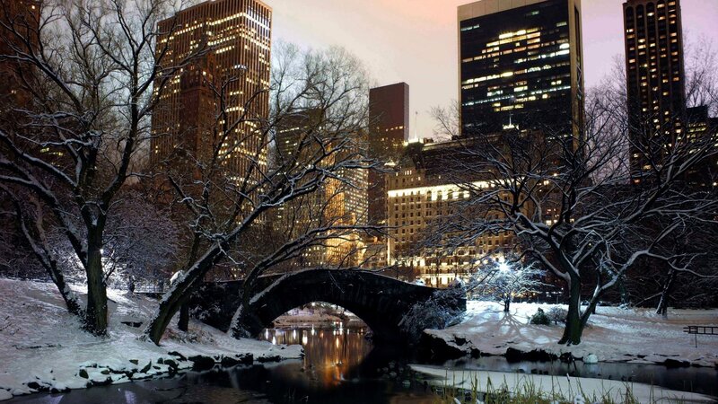 Snow-covered Bridge in Park