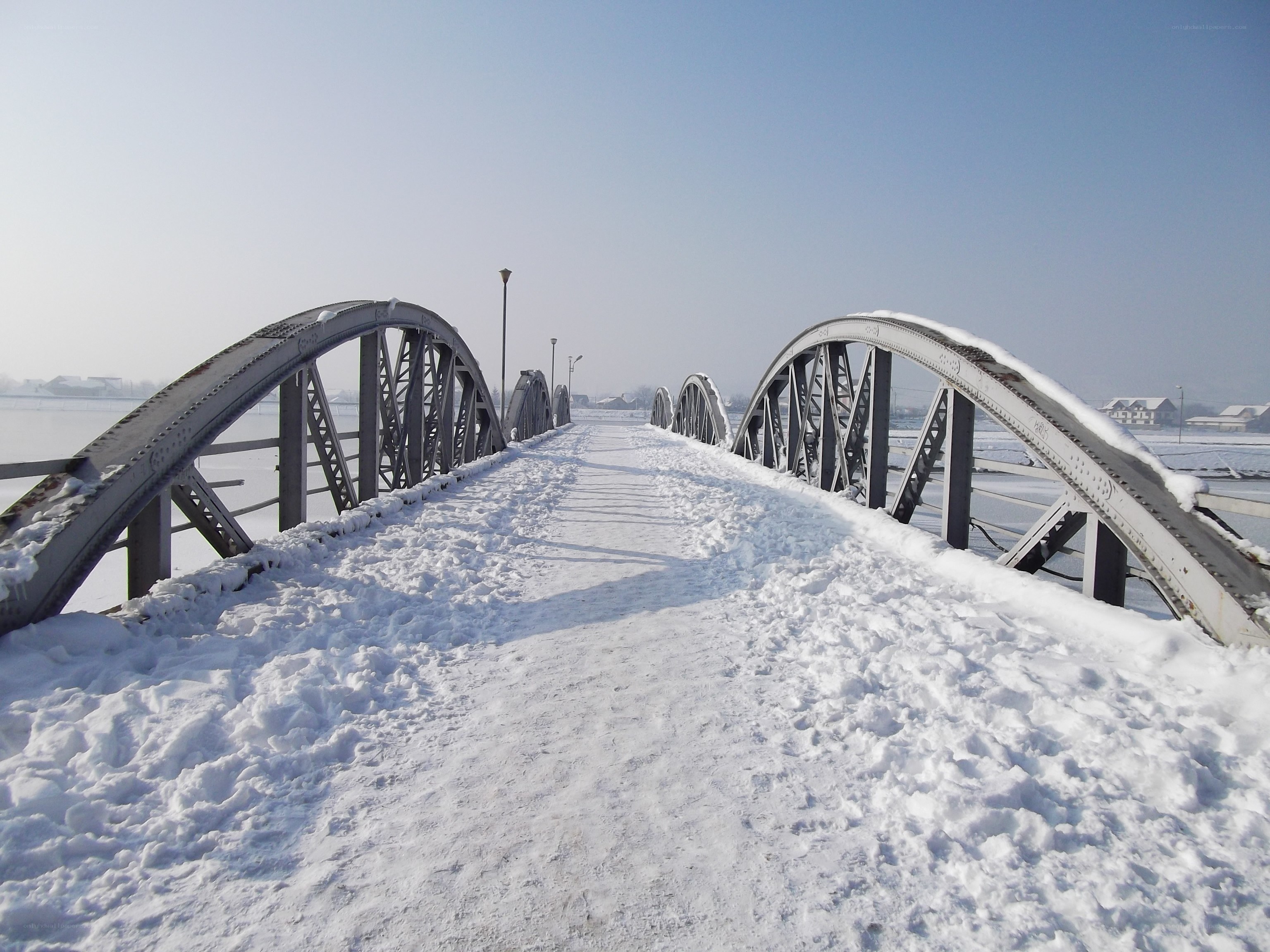 Snow-covered bridge in winter