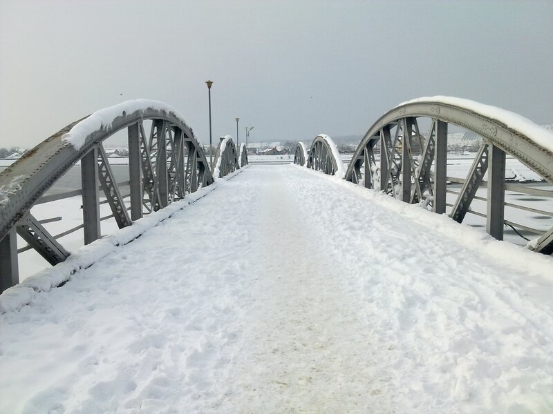 Snow-covered bridge in winter