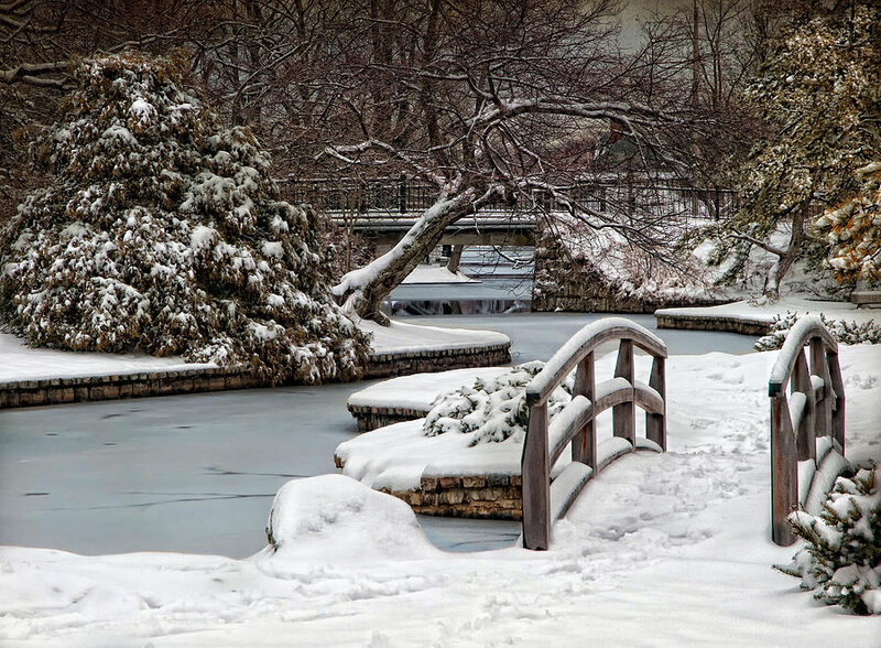 Snow-covered Bridge over Pond