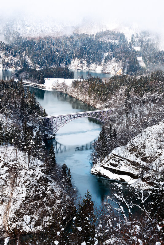 Snow-covered Bridge over River — White, Serene