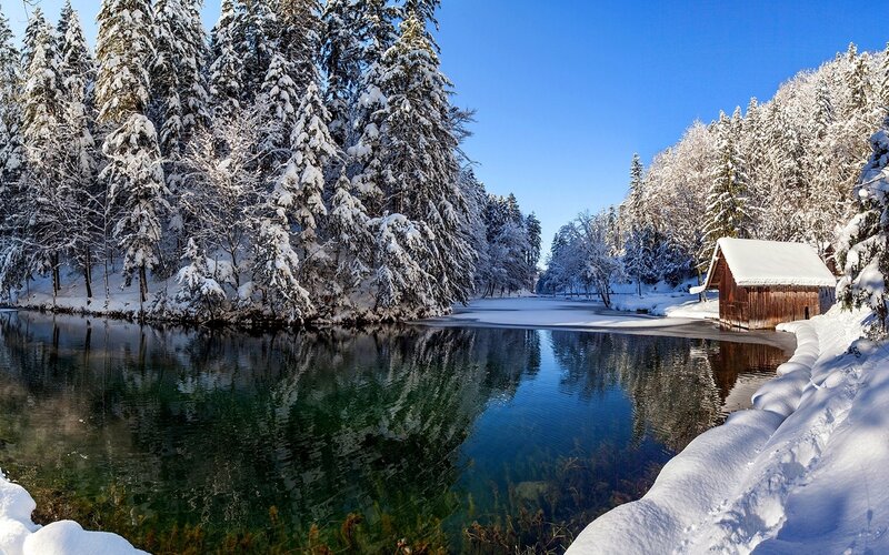 Snow-covered Cabin by Lake — Blue, Serene, Winter, Photograph