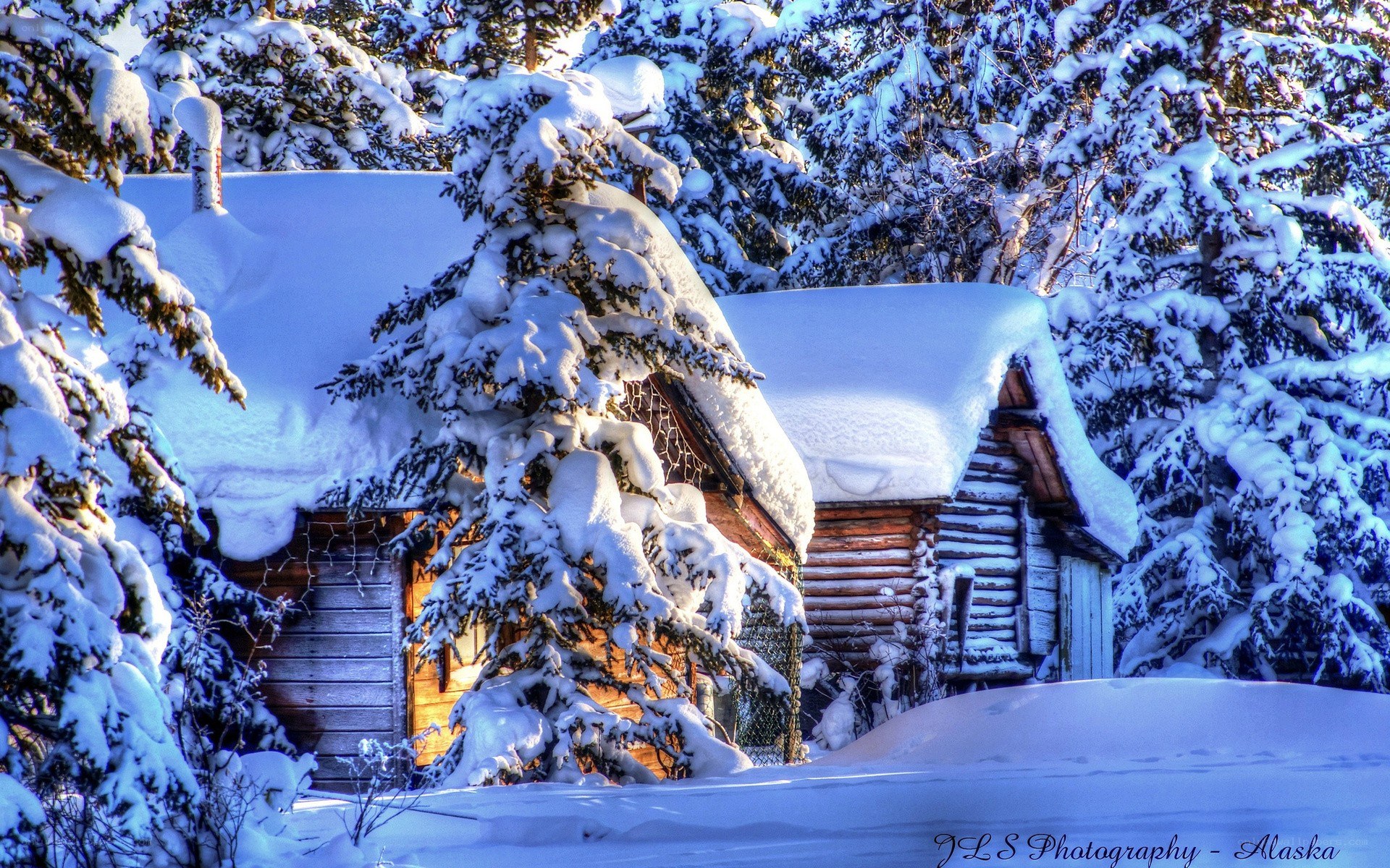 Snow-covered cabin in Alaska