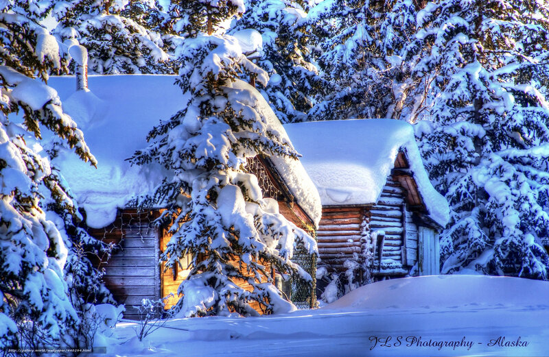 Snow-covered cabin in Alaska