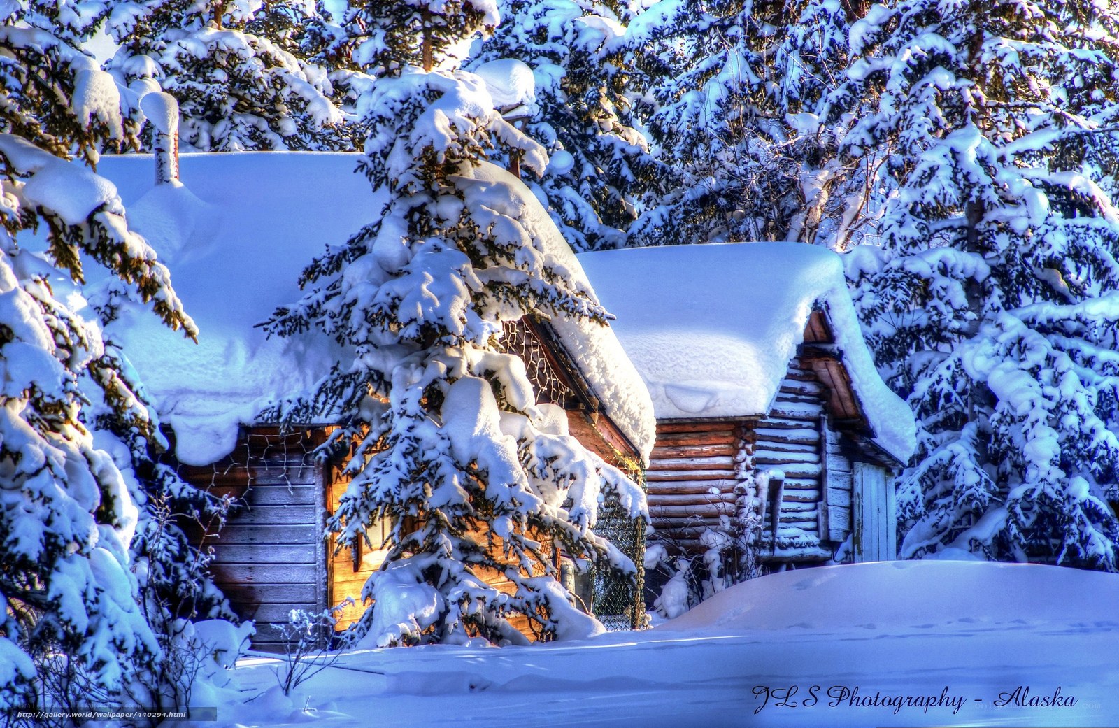 Snow-covered cabin in Alaska