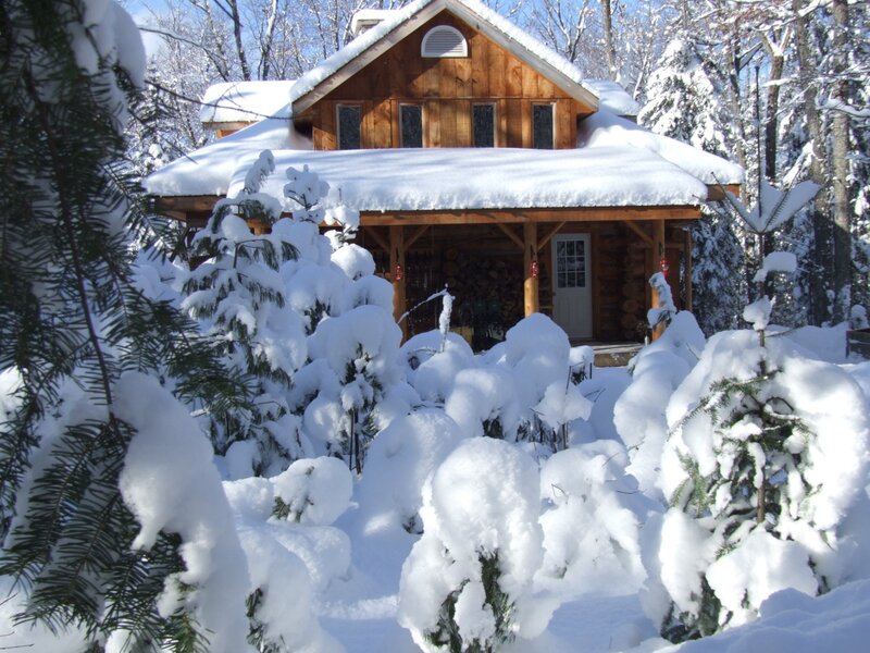 Snow-covered cabin in winter