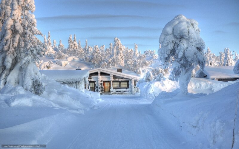 Snow-covered cabin in winter