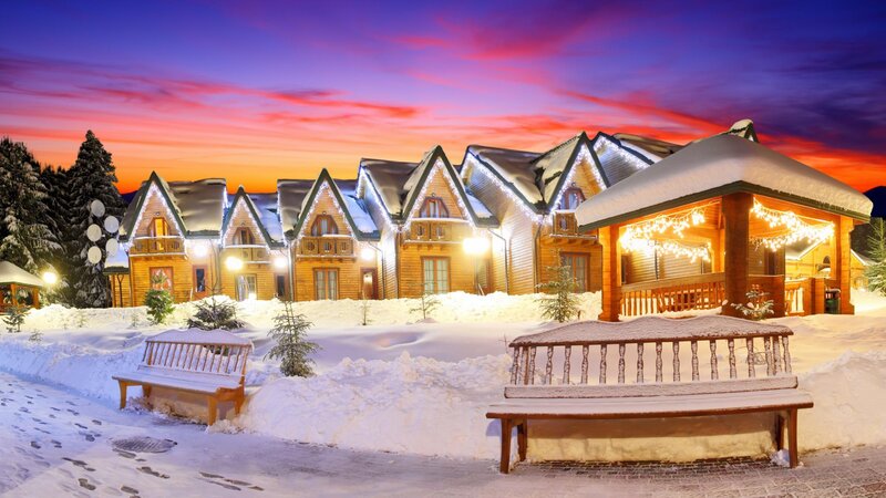 Snow-covered Cabins at Dusk — Purple