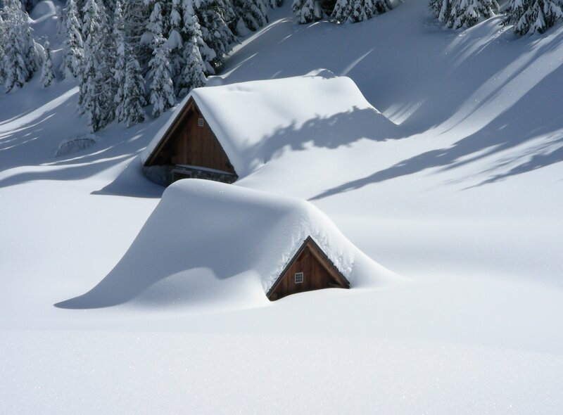 Snow-covered cabins in winter