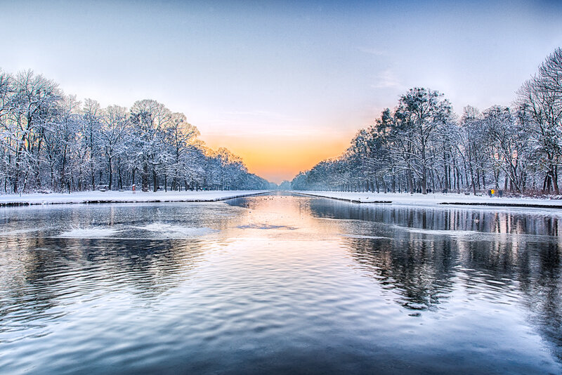Snow-covered Canal at Sunset
