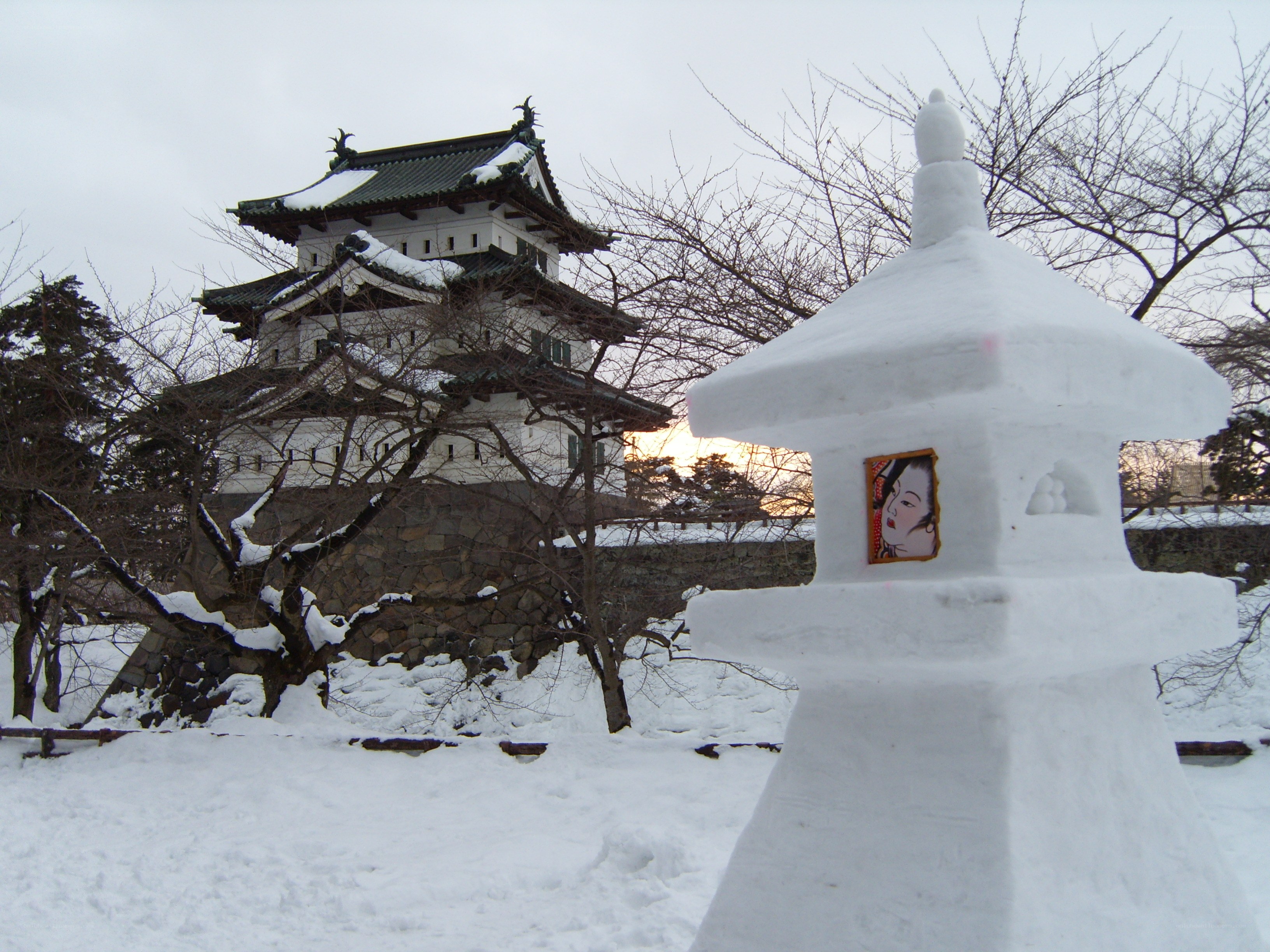 Snow-covered castle with snow lantern