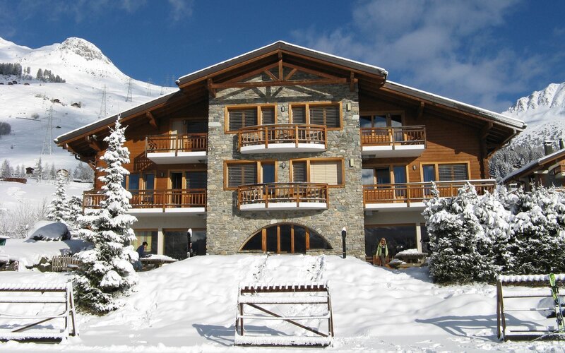 Snow-covered Chalet — White, Serene, Winter