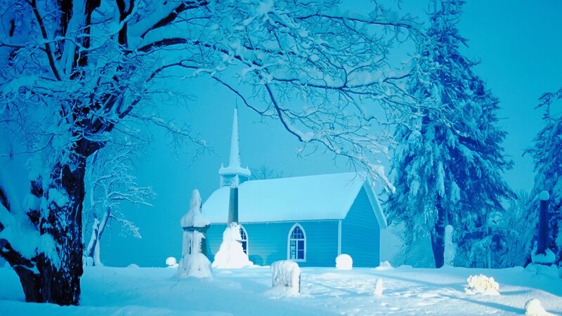 Snow-covered church in winter
