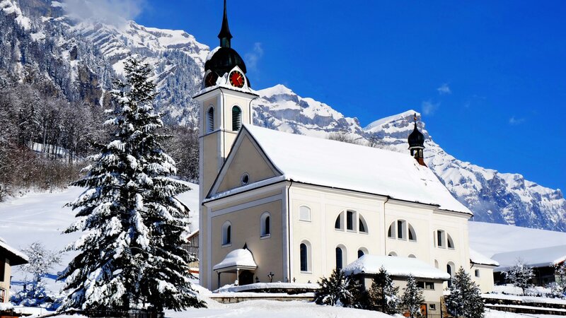 Snow-covered Church — White, Serene, Winter, Photograph, Mountains, Trees, Clock Tower