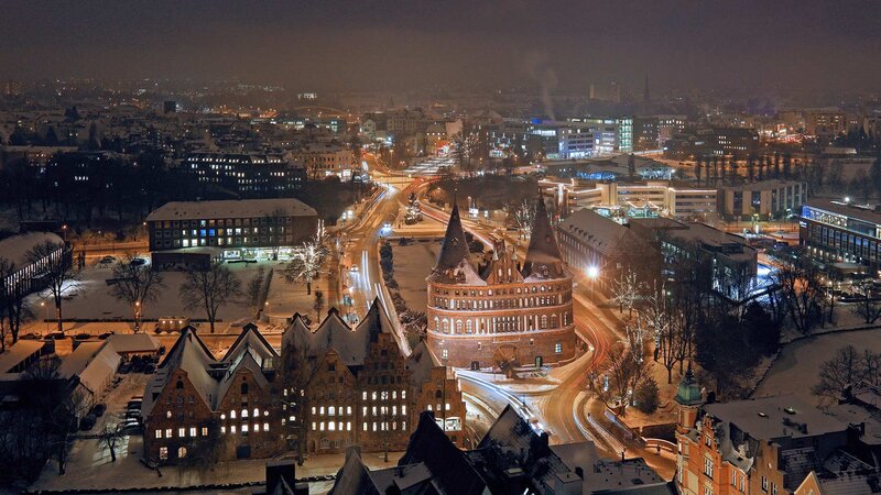 Snow-covered City at Night — Black