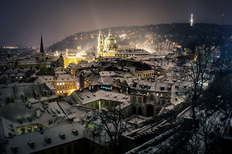 Snow-covered City at Night — White, Serene, Photograph, Buildings