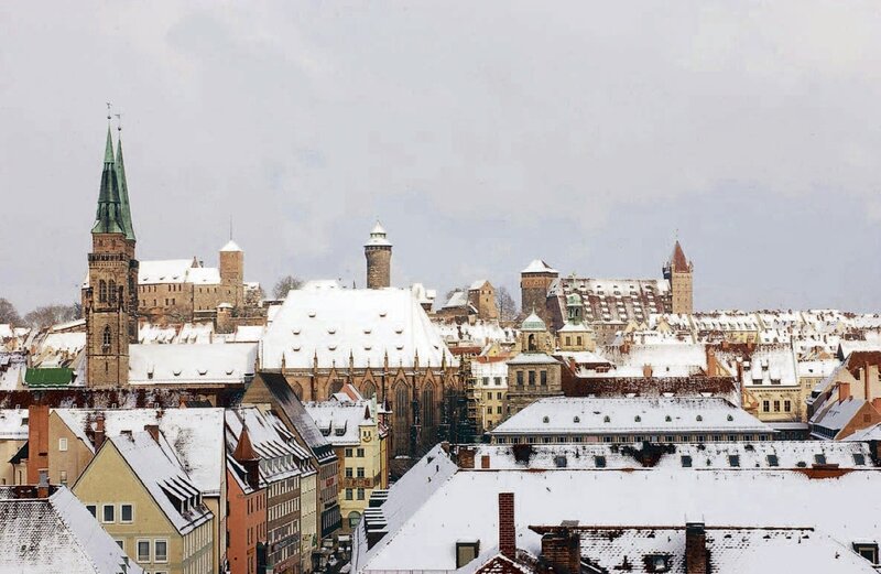 snow-covered city rooftops