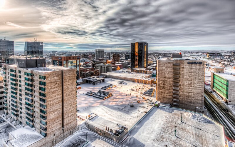 Snow-covered City Rooftops — Gray