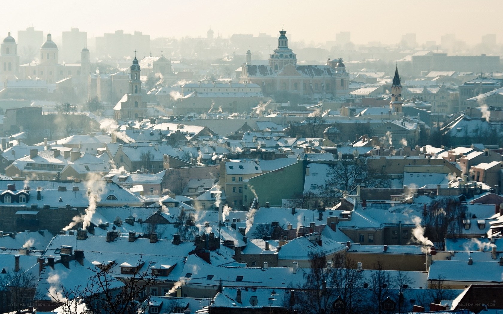 Snow-covered city rooftops