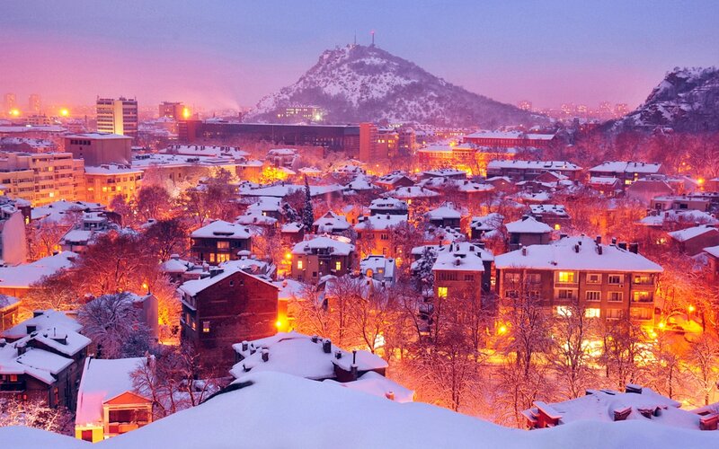 Snow-covered Cityscape — Purple, Serene, Winter