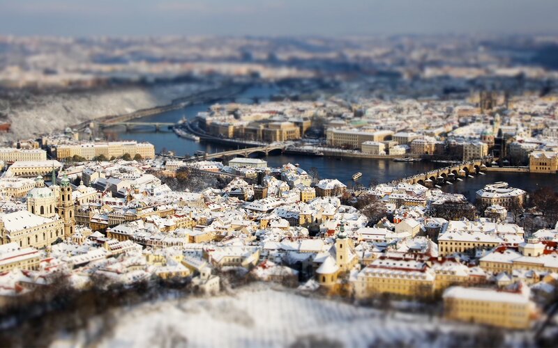 Snow-covered Cityscape — White, Serene, Winter, Photograph, River, Bridges, Buildings